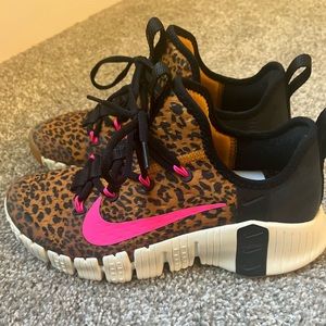 8.5 Nike cheetah shoes with hot pink Nike swoosh